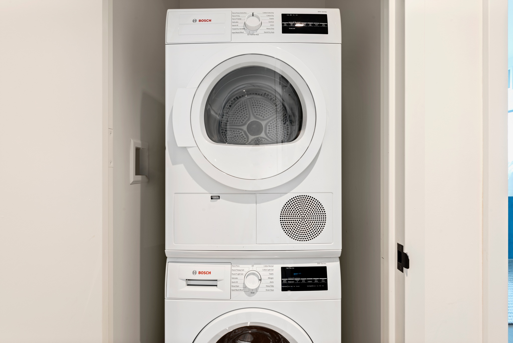 Bosch vertically stacked washer and dryer in white
